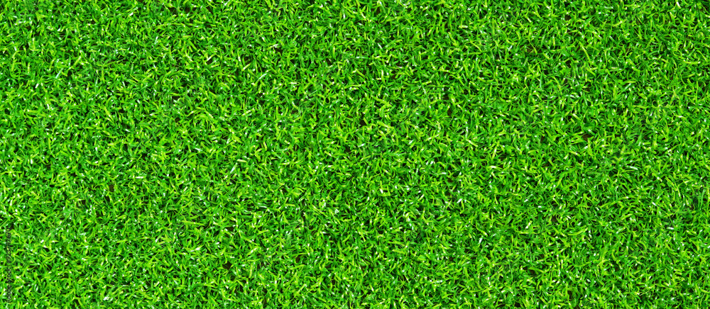 Fototapeta premium Artificial green grass mat, top view. Texture. Artificial turf, surface made of synthetic fibers. Flat green grass texture background. Short artificial grass golf surface