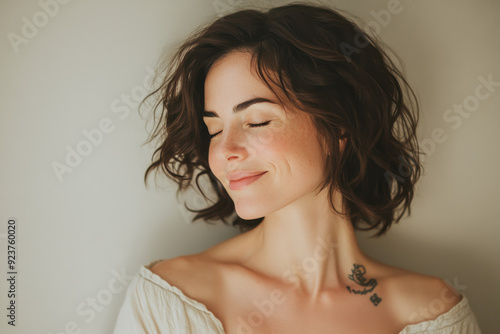 Wallpaper Mural A close up of a woman's face with tattoos and her eyes closed Torontodigital.ca