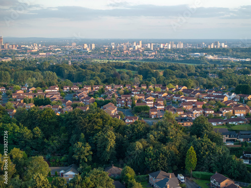 Aerial image of Prestwich, Greater Manchester with Salford Quays on the background. 