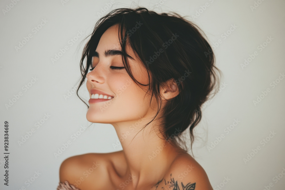 A close up of a woman's face with tattoos and her eyes closed A close up of a woman's face with tattoos and her eyes closed