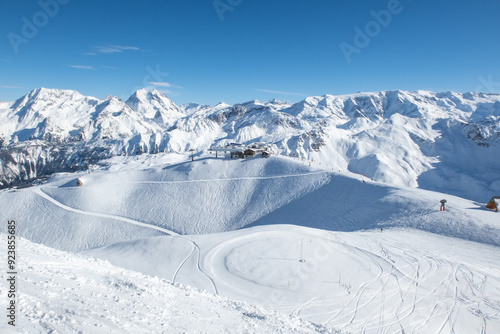 Ski tracks at the top of a mountain in the French Alps