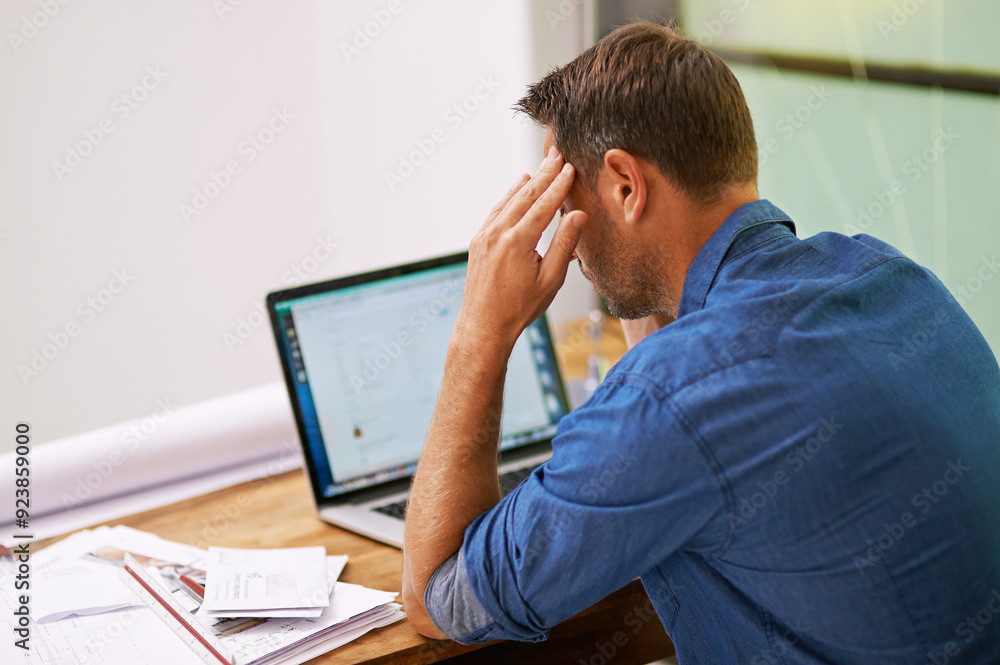 Stress, finance documents and man on laptop in home for budget, financial review and mortgage payment. Thinking, computer and frustrated with paperwork for insurance, investment and bills headache Stress, finance documents and man on laptop in home for budget, financial review and mortgage payment. Thinking, computer and frustrated with paperwork for insurance, investment and bills headache