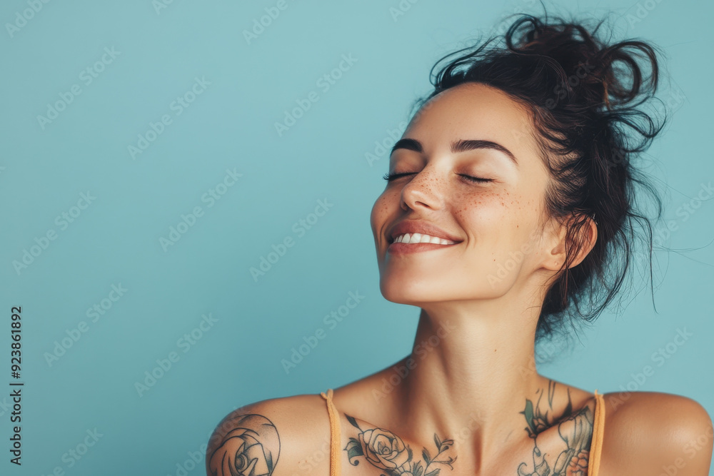 A close up of a woman's face with tattoos and her eyes closed A close up of a woman's face with tattoos and her eyes closed