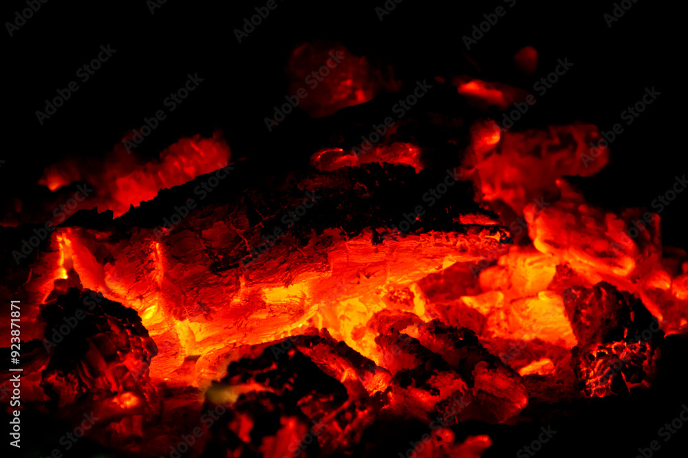 Bonfire burning in a campsite, texture close-up. Bonfire burning in a campsite, texture close-up.