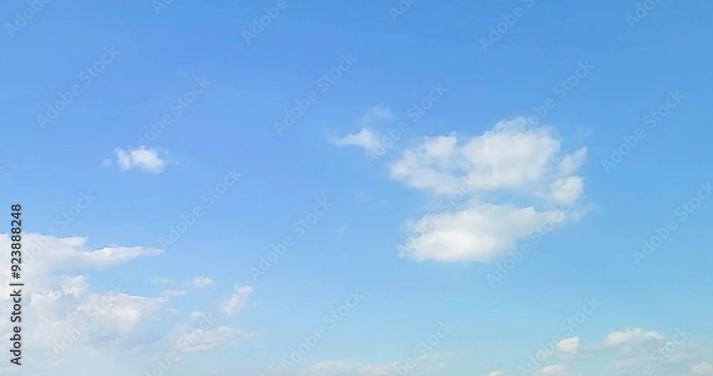 Cloudscape, a timelapse of a beautiful blue sky with white clouds, for a background Cloudscape, a timelapse of a beautiful blue sky with white clouds, for a background