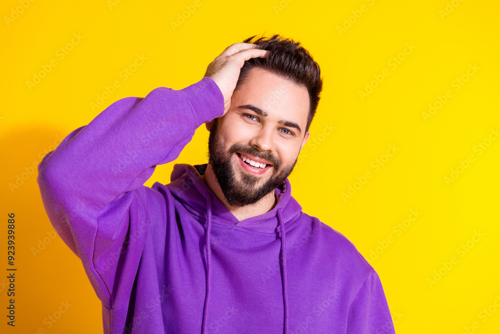 Photo of attractive positive groomed nice man wear stylish clothes enjoy like haircut isolated on yellow color background Photo of attractive positive groomed nice man wear stylish clothes enjoy like haircut isolated on yellow color background