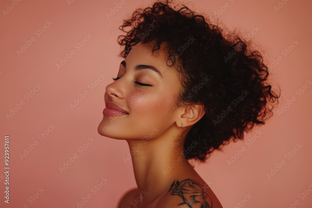 A close up of a woman's face with tattoos and her eyes closed A close up of a woman's face with tattoos and her eyes closed