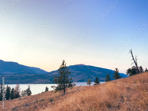 Landscape with mountains and lake on a hot summer evening