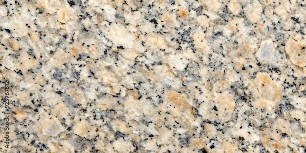 Natural Granite Texture - Warm Hues and Fine Grain. A closeup image of polished granite featuring a warm palette of beige, cream, and black in a fine-grained pattern. Ideal for backgrounds, textures. Natural Granite Texture - Warm Hues and Fine Grain. A closeup image of polished granite featuring a warm palette of beige, cream, and black in a fine-grained pattern. Ideal for backgrounds, textures.