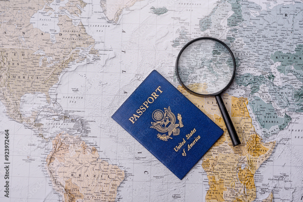 Conceptual background for travel with passport, magnifying glass, world map and money Conceptual background for travel with passport, magnifying glass, world map and money