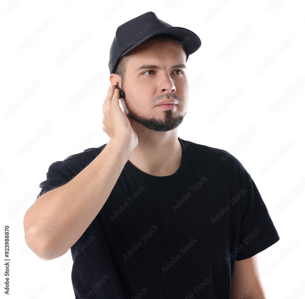 Young bodyguard with earpiece isolated on white Young bodyguard with earpiece isolated on white