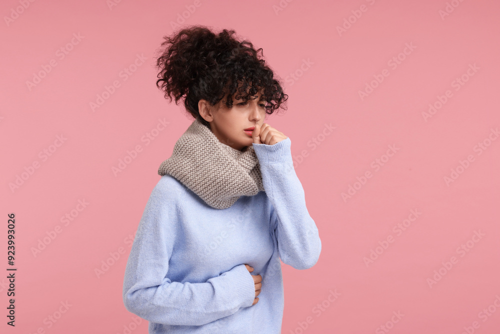 Cold symptom. Young woman suffering from illness on pink background Cold symptom. Young woman suffering from illness on pink background