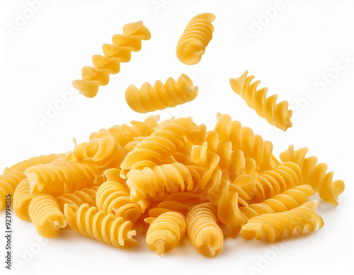 Isolated against a white background, entire department of raw Fusilli, Rotini, and uncooked Italian Pasta