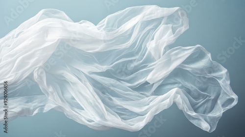 Wallpaper Mural A delicate capture of flowing white sheer fabric, showcasing its light and airy texture with soft waves and gentle movement, evoking a sense of grace and fluidity. Torontodigital.ca