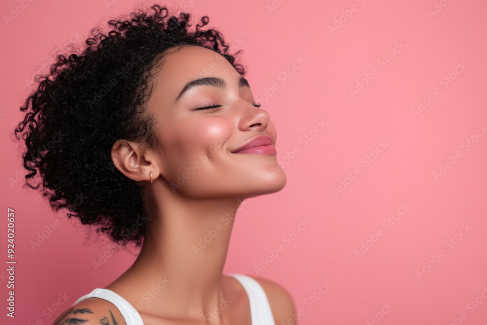 A close up of a woman's face with tattoos and her eyes closed A close up of a woman's face with tattoos and her eyes closed