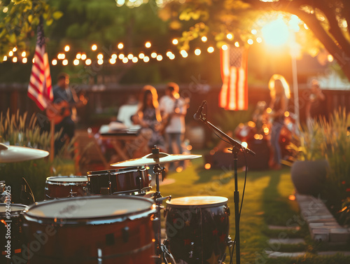 Young people performing on a backyard stage, laughing and enjoying a talent show together.