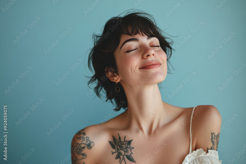 A close up of a woman's face with tattoos and her eyes closed A close up of a woman's face with tattoos and her eyes closed