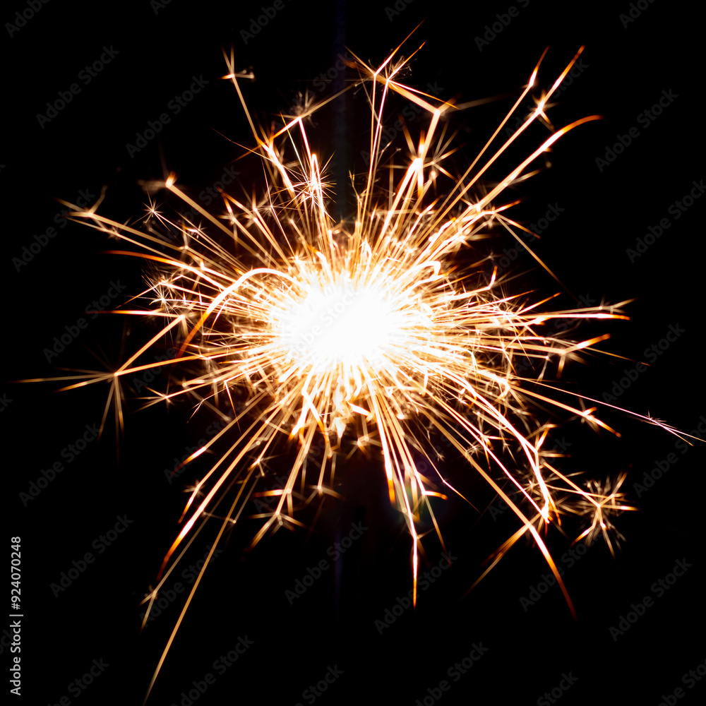 Sparklers on black isolated background. Sparks from a burning sparkler. To insert an image in a blend mode Sparklers on black isolated background. Sparks from a burning sparkler. To insert an image in a blend mode