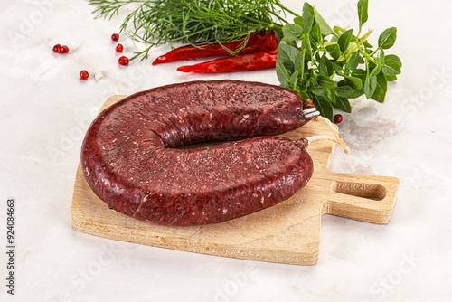 Delicious dry cured beef basturma on table, closeup photo