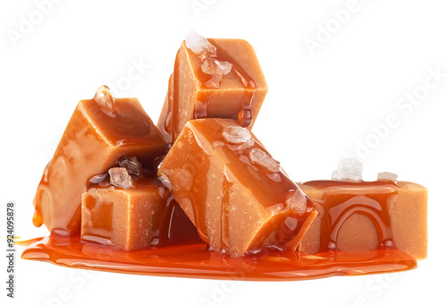 Tableau sur toile Caramel candies in milk caramel sauce with sea salt isolated on a white backgrou