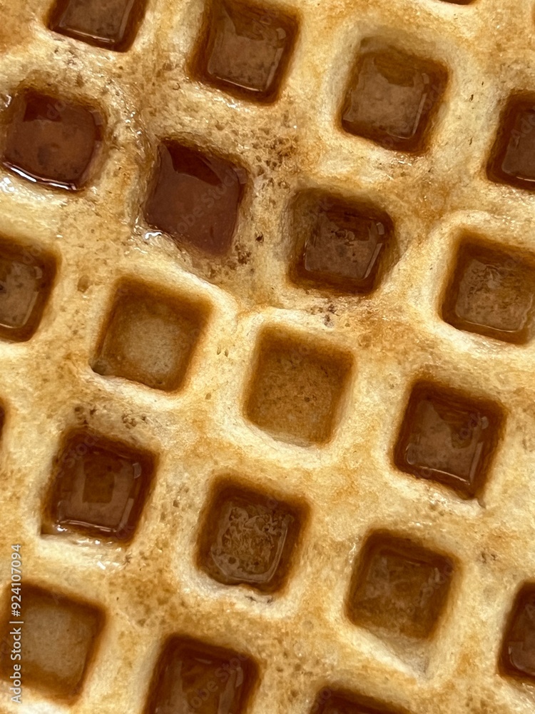 Close up of a waffle with syrup Close up of a waffle with syrup
