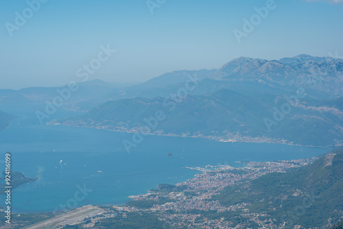 view from the top of the mountain on Boka bay in Montenegro on a sunny day. Adriatic Sea Bay seen from mountains.