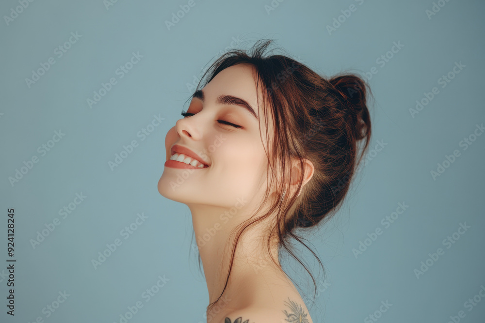 A close up of a woman's face with tattoos and her eyes closed A close up of a woman's face with tattoos and her eyes closed