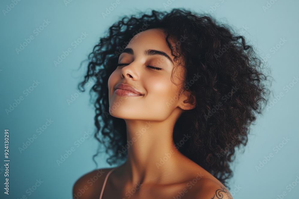 A close up of a woman's face with tattoos and her eyes closed A close up of a woman's face with tattoos and her eyes closed