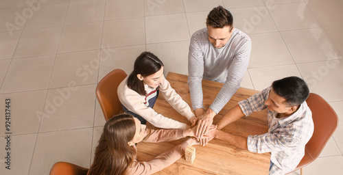 Team of business people put...