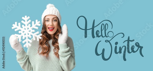 Happy woman in warm clothes...