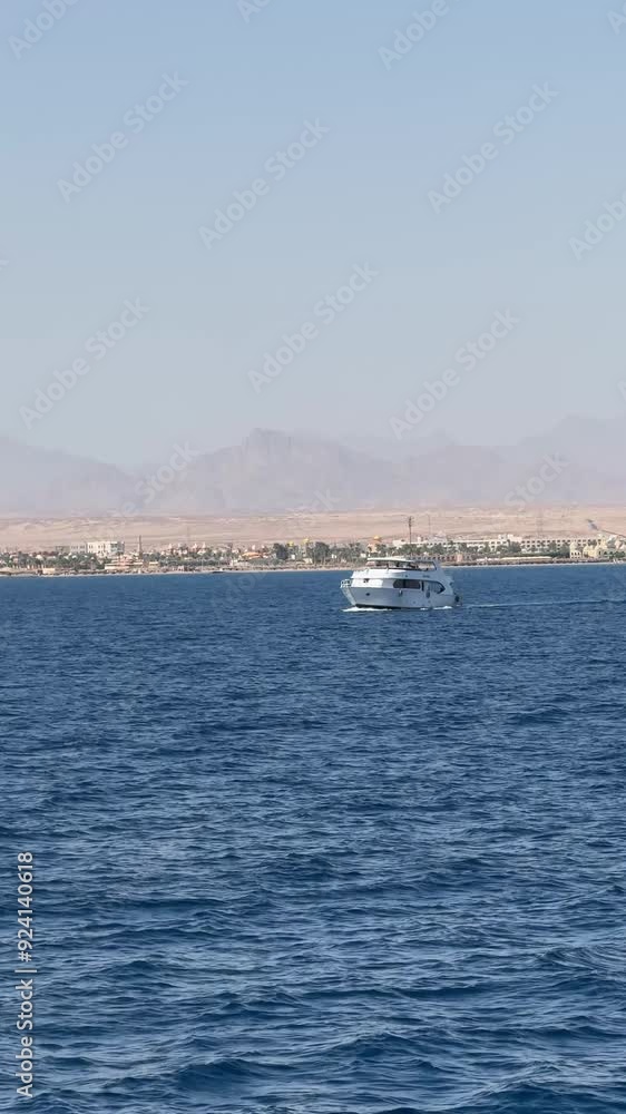 The view of the Red Sea from a cruise ship's deck reveals sparkling blue waters and a serene, expansive horizon.