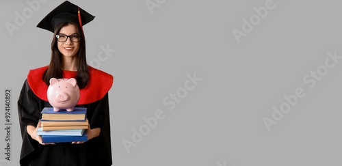 Happy female graduating stu...