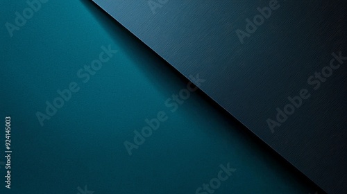 Diagonal line on a textured dark blue background, creating two triangle shapes, one dark and one teal, with a slight gradient