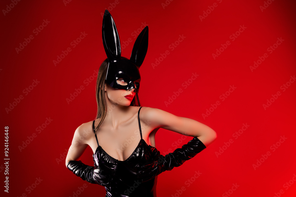 Photo of glamour gorgeous lovely flirty girl latex costume look empty space isolated on red gradient color background Photo of glamour gorgeous lovely flirty girl latex costume look empty space isolated on red gradient color background