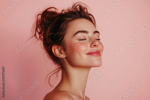 A close up of a woman's face with tattoos and her eyes closed