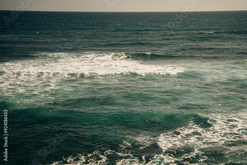 A view of the Pacific Ocean from the cliffs of the Mahaulepu Heritage Trail in Poipu, Kauai, Hawaii, USA