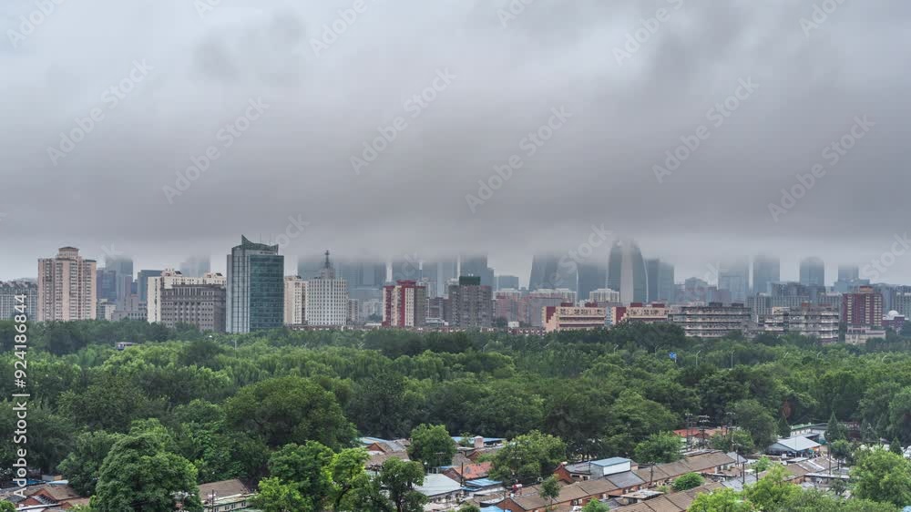 China Beijing city high-rise buildings through the clouds and rainy day building sea of clouds China Beijing city high-rise buildings through the clouds and rainy day building sea of clouds