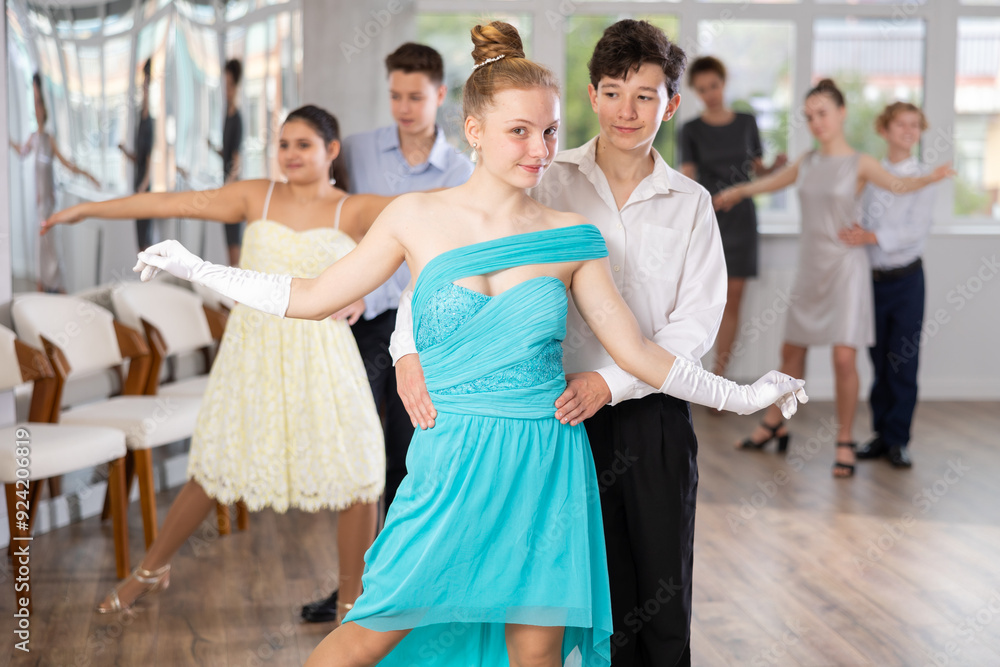 Emotional adolescent ballroom dancers, girls and boys in formal wear ...