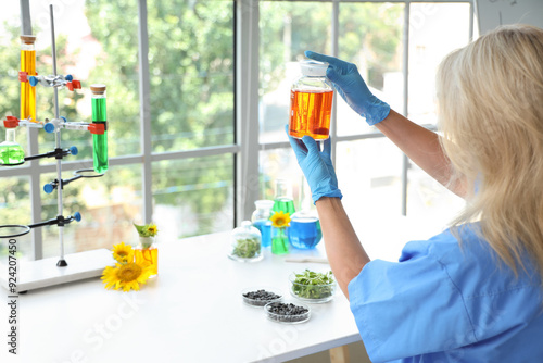 Female scientist in blue sc...