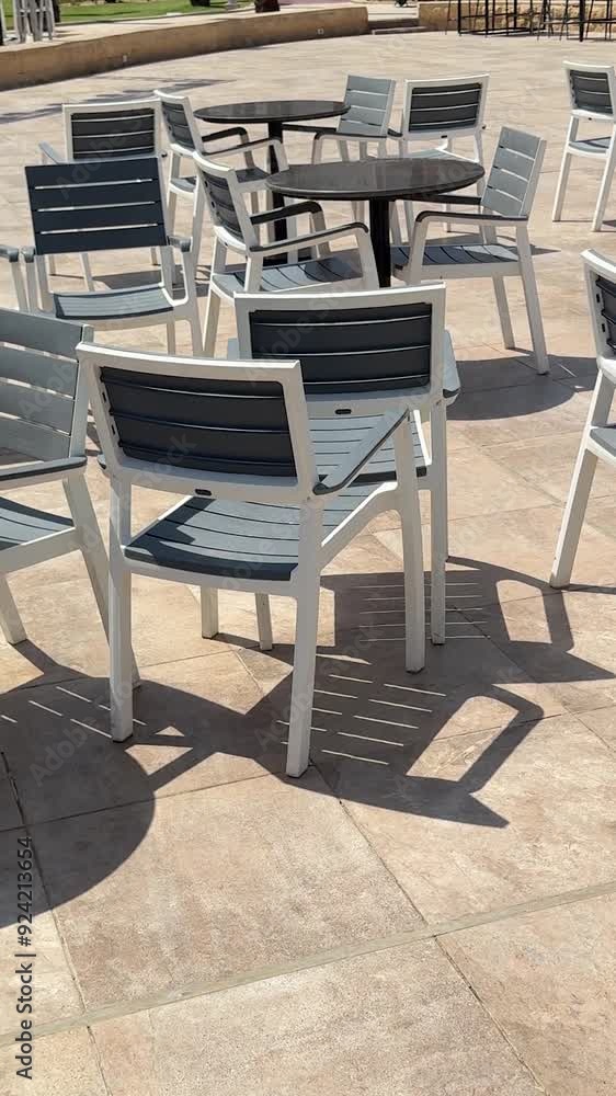 Recreational area at the resort. Daytime, empty chairs. Recreational area at the resort. Daytime, empty chairs.