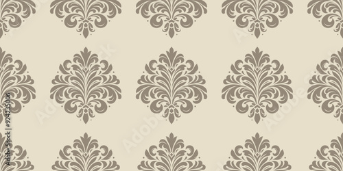 Elegant damask pattern in beige and taupe. Classic floral ornaments for wallpaper, fabrics, and invitations.