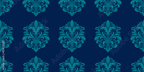 Elegant damask pattern in navy blue and teal. Classic floral ornaments for luxurious wallpaper and textiles.