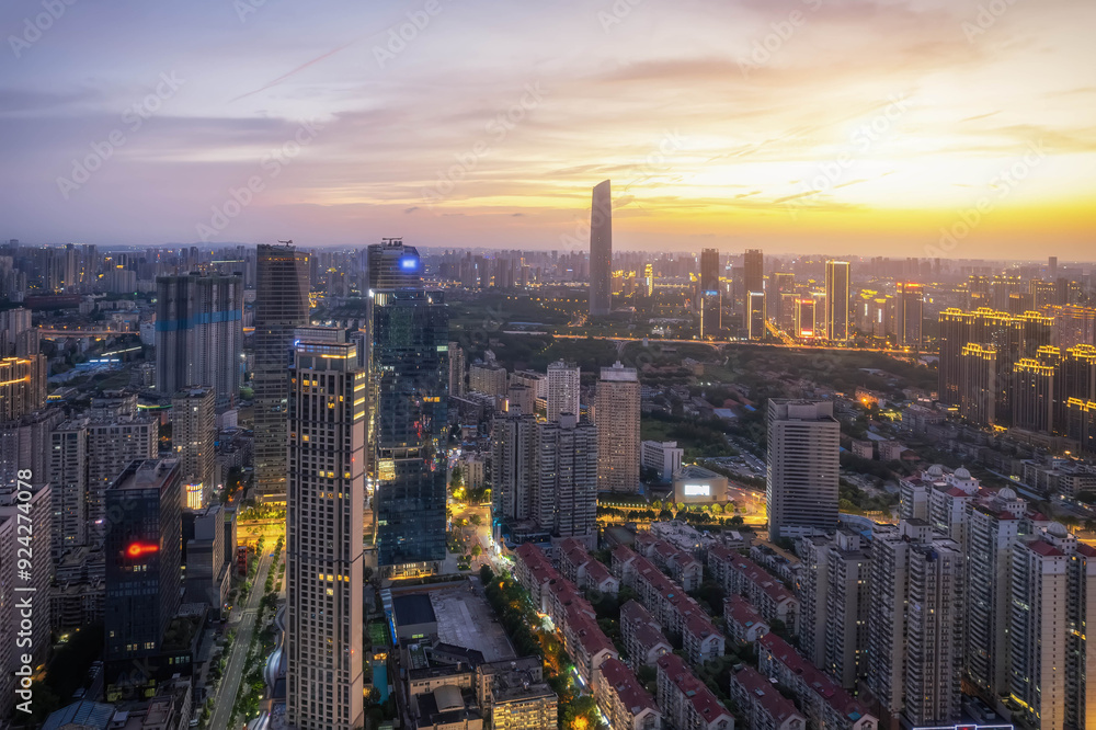 Fototapeta premium Captivating Aerial Cityscape at Sunset with Skyline and Urban Life
