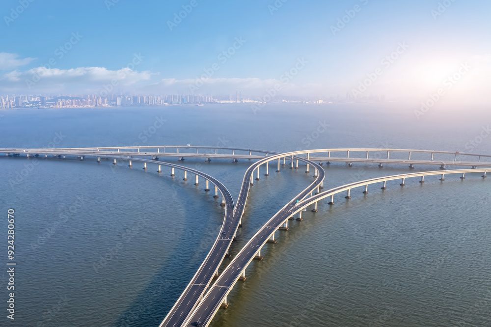 Aerial View of a Modern Bridge Intersection over Water Aerial View of a Modern Bridge Intersection over Water