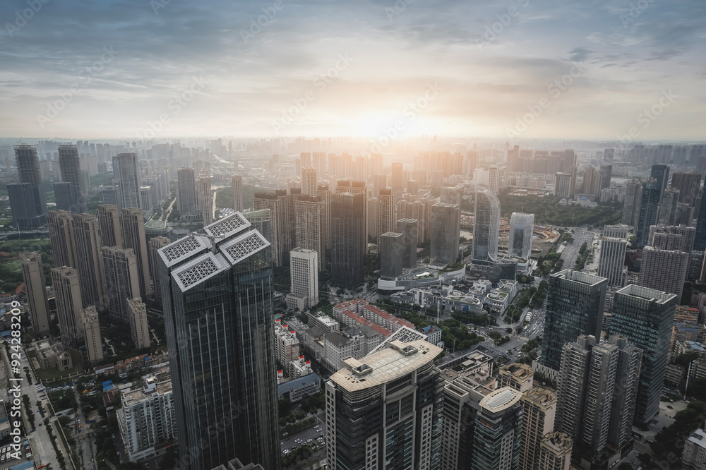 Fototapeta premium A Stunning Aerial View of a Cityscape at Sunset