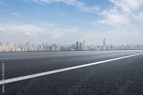 Scenic City Landscape with Open Road Leading to Urban Skyline