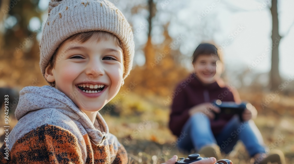 Obraz premium A child exploring nature contrasts with another glued to a screen; outdoors boosts health and creativity.