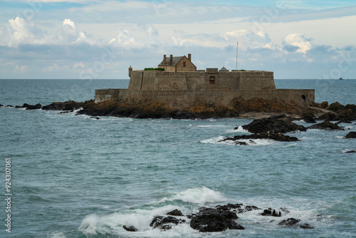 Petit Be Fort on a small island in the waters of the English Channel near the walls of the fortress city of Saint-Malo on a sunny summer day, Saint-Malo, Brittany, France