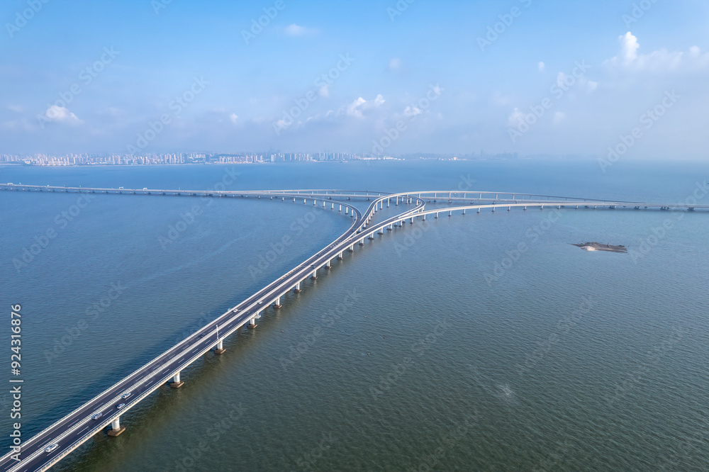 Majestic Aerial View of a Modern Bridge Over Tranquil Waters Majestic Aerial View of a Modern Bridge Over Tranquil Waters
