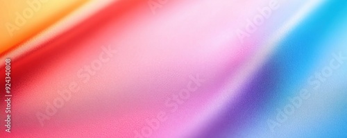 A vibrant and colorful abstract background featuring smooth gradients of orange, pink, and blue, perfect for creative projects.